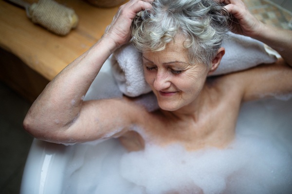 Meridian Idaho resident washing her hair in a walk-in tub